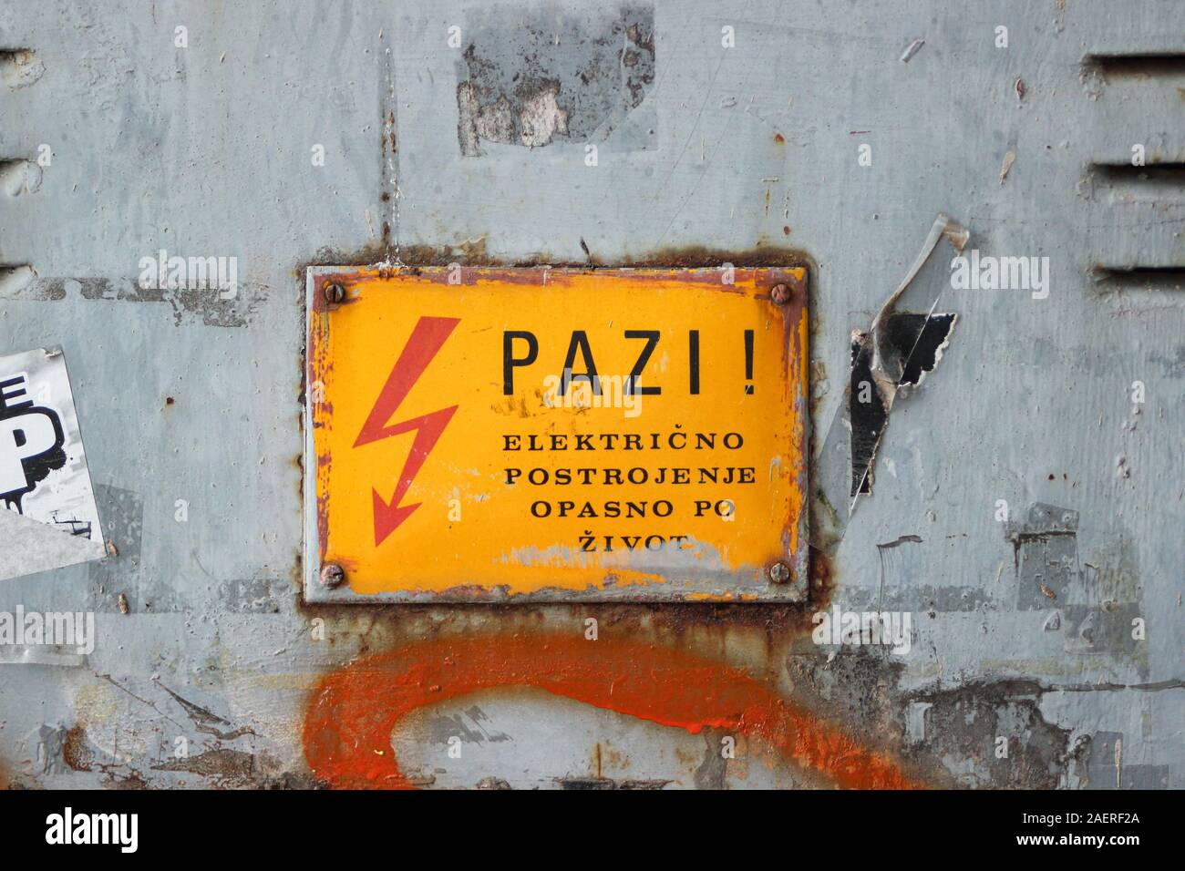 Pazi! Danger! Warning sign on electrical cabinet door in Dubrovnik, Croatia. Stock Photo
