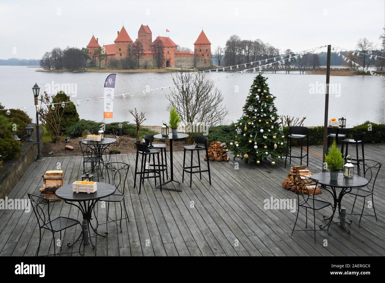 Medieval castle of Trakai, Vilnius, Lithuania, Eastern Europe, located between beautiful lakes and nature, view from a restaurant with Christmas tree Stock Photo