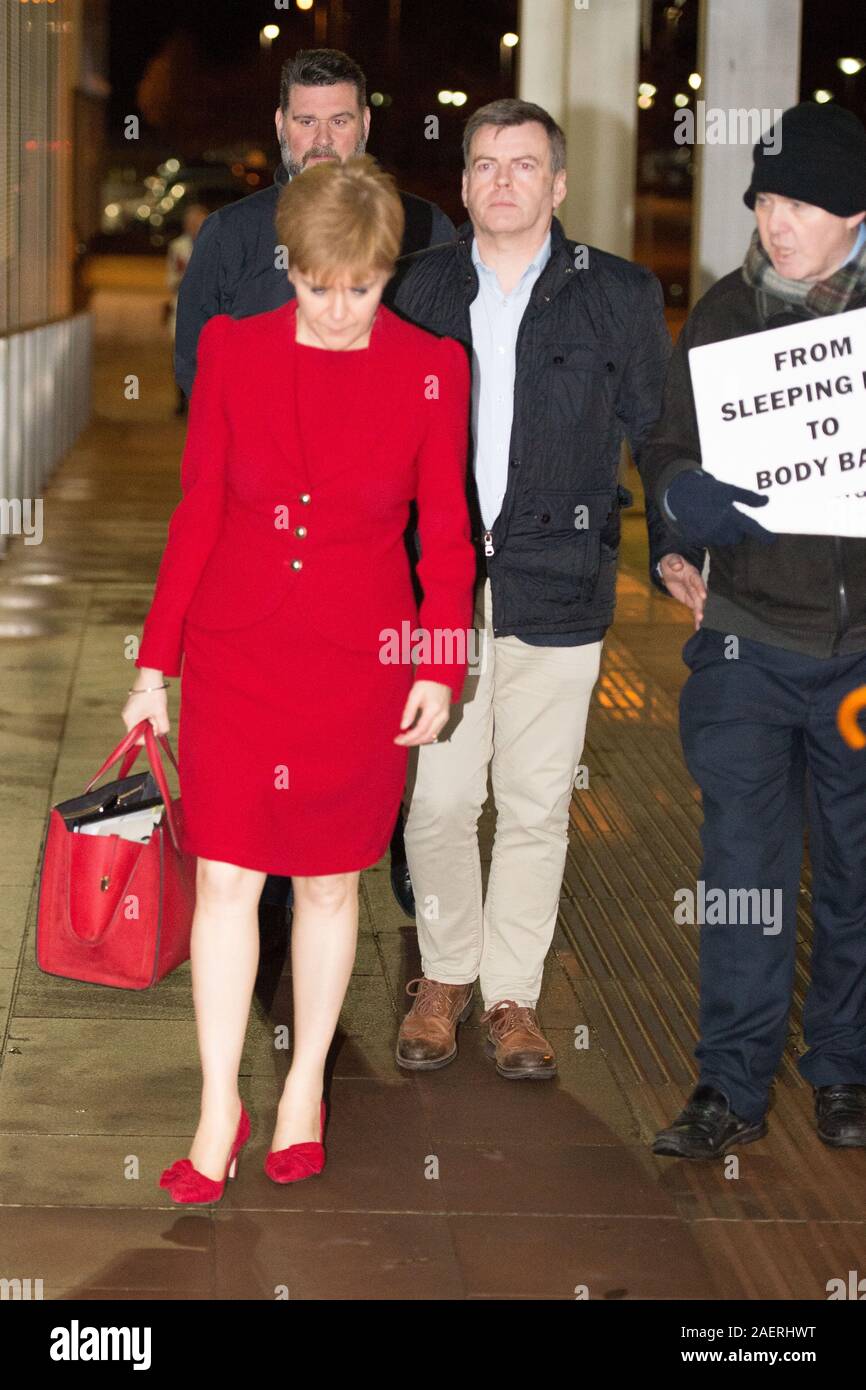Glasgow, UK. 10 December 2019. Pictured: (in red) Niccola Sturgeon MSP - First Minbister of Scotland and LEader of the Scottish NAtional Party (SNP); (right), Sean Clerekin and Ryan Randall from the Scottish Tennants Organisation.  The Scottish Tennants Organisation have asked all the party leaders for more winter night shelters for the homeless in Glasgow and Scotland and to reverse the homeless cuts in Glasgow. Credit: Colin Fisher/Alamy Live News Stock Photo