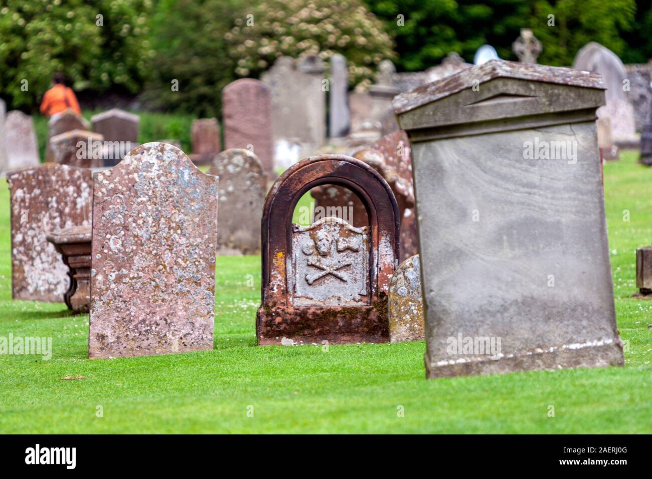 Tombstones in Melrose Abbey, partly ruined monastery of the Cistercian order in Melrose, Roxburghshire, Scottish Borders, Scotland, UK Stock Photo