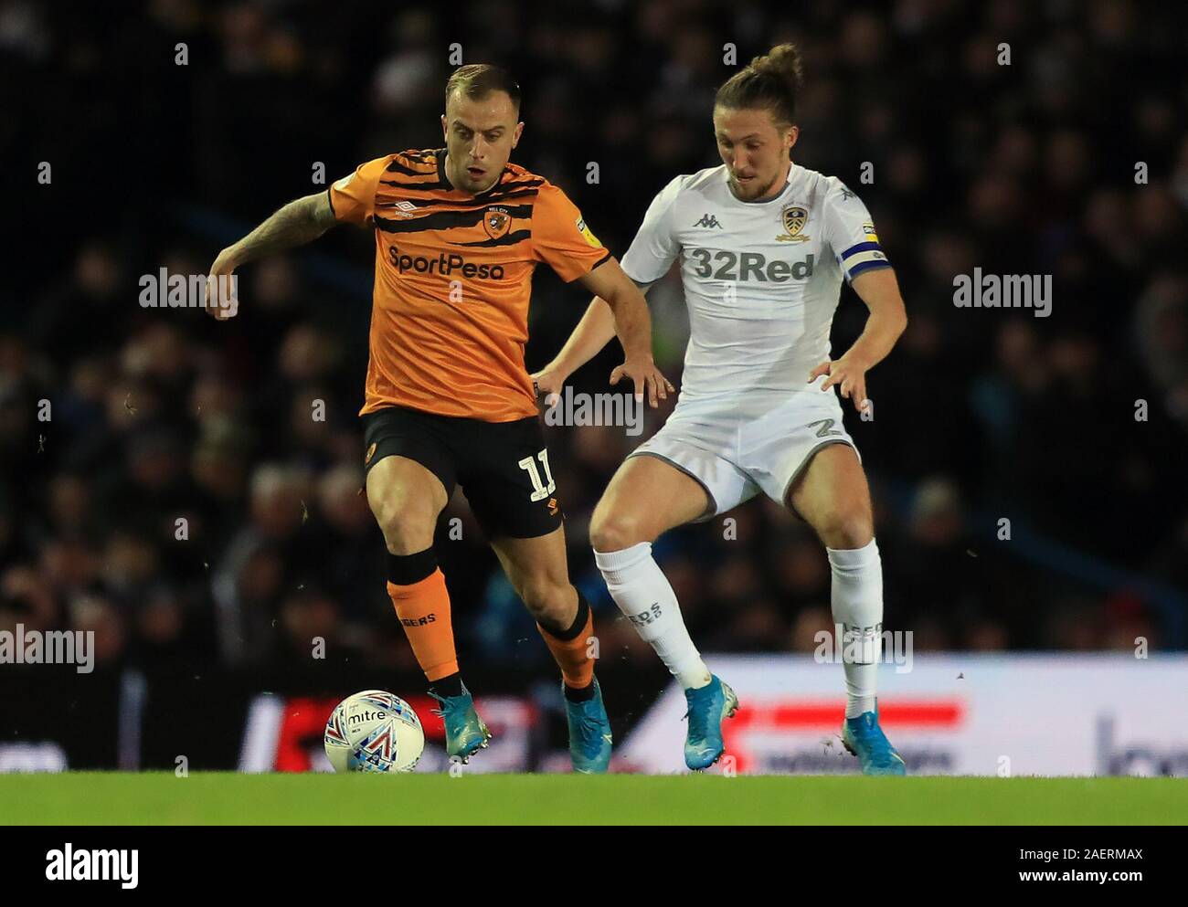 Hull City's Kamil Grosicki and Leeds United's Luke Ayling (right) battle for the ball during the Sky Bet Championship match at Elland Road, Leeds. Stock Photo