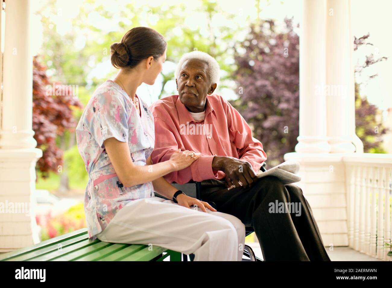 Two women sit on porch hi-res stock photography and images - Alamy