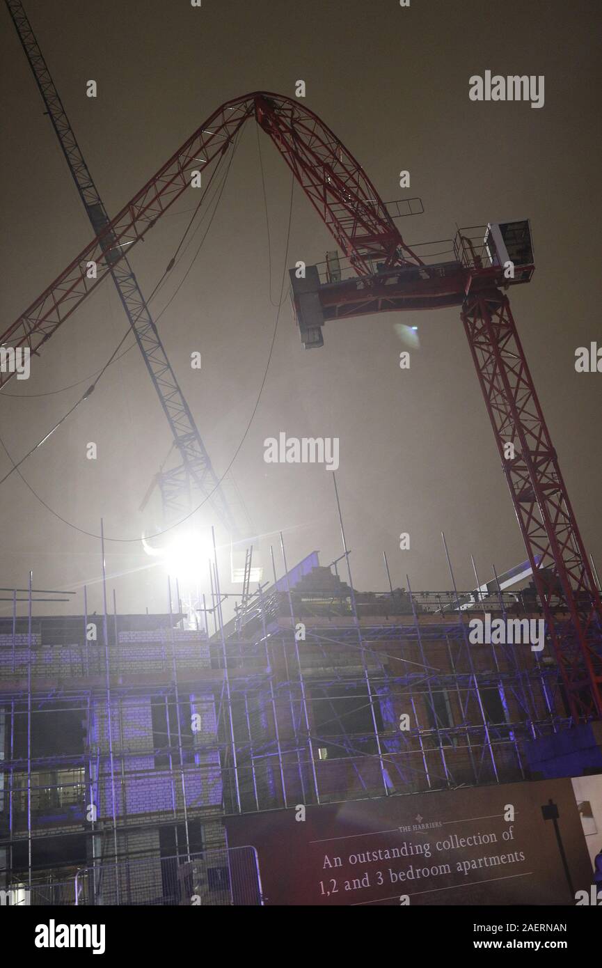 The scene at Fassett Road in south London, where a crane partially