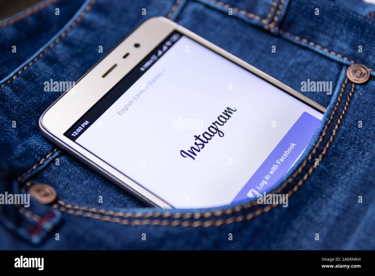 Icon instagram on the smartphone screen in your jeans pocket. Cheboksary, Russia, 02/17/2019 Stock Photo