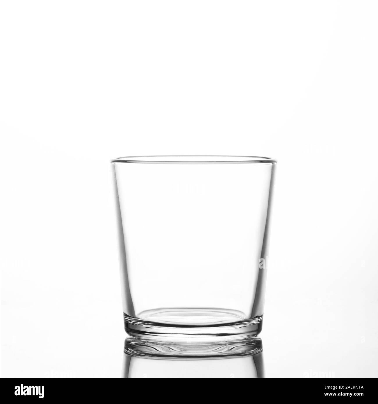 Empty water, juice drinking  glass on white background. Stock Photo