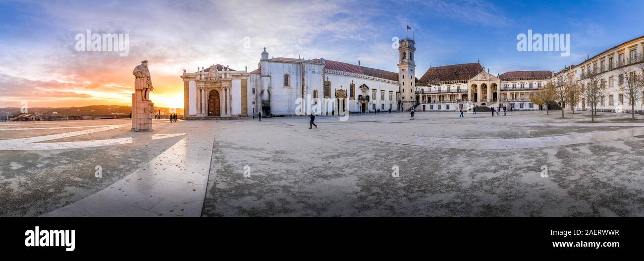 Coimbra university main square with the Royal palace, bell tower, Joanina baroque library during sunset in Portugal Stock Photo