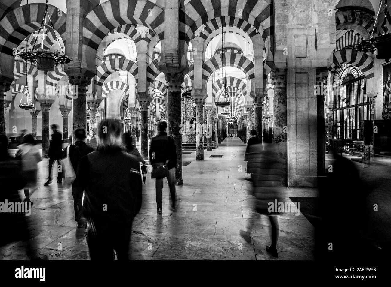 tourists in the mosque of cordoba in spain Stock Photo