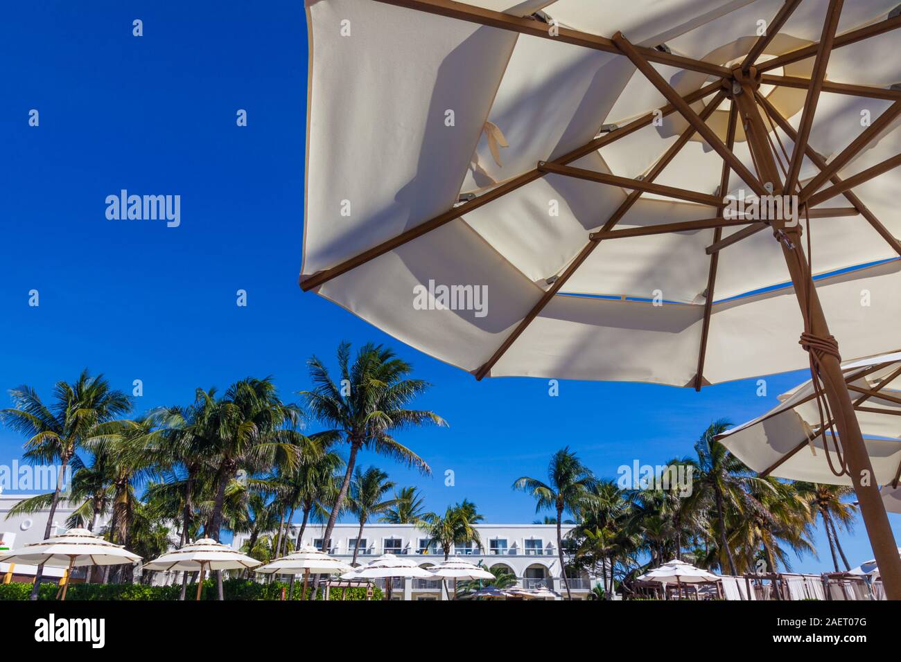 Abstract image of umbrellas against a vivid blue sky at a luxury reort