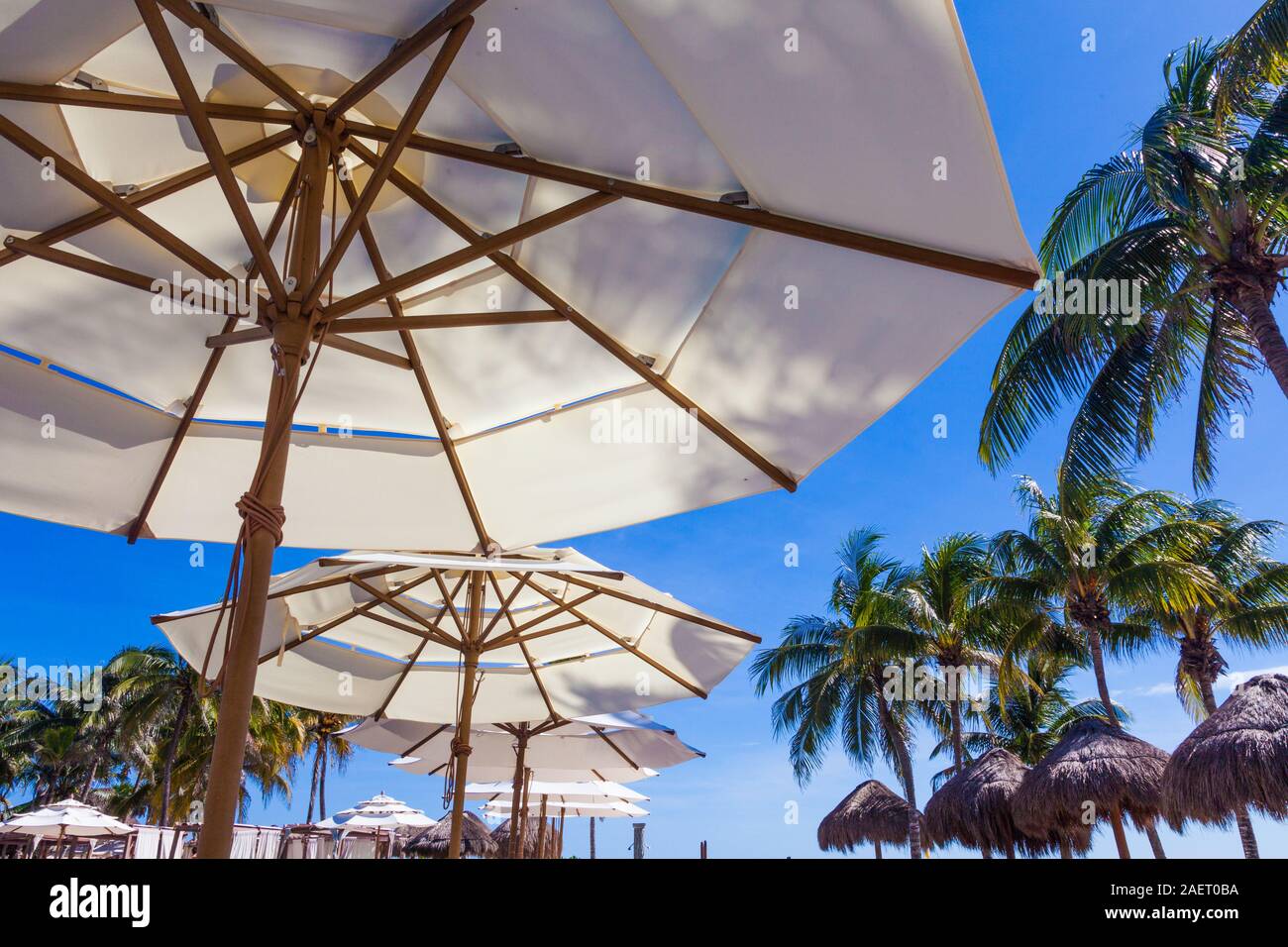 Abstract image of umbrellas against a vivid blue sky at a luxury reort