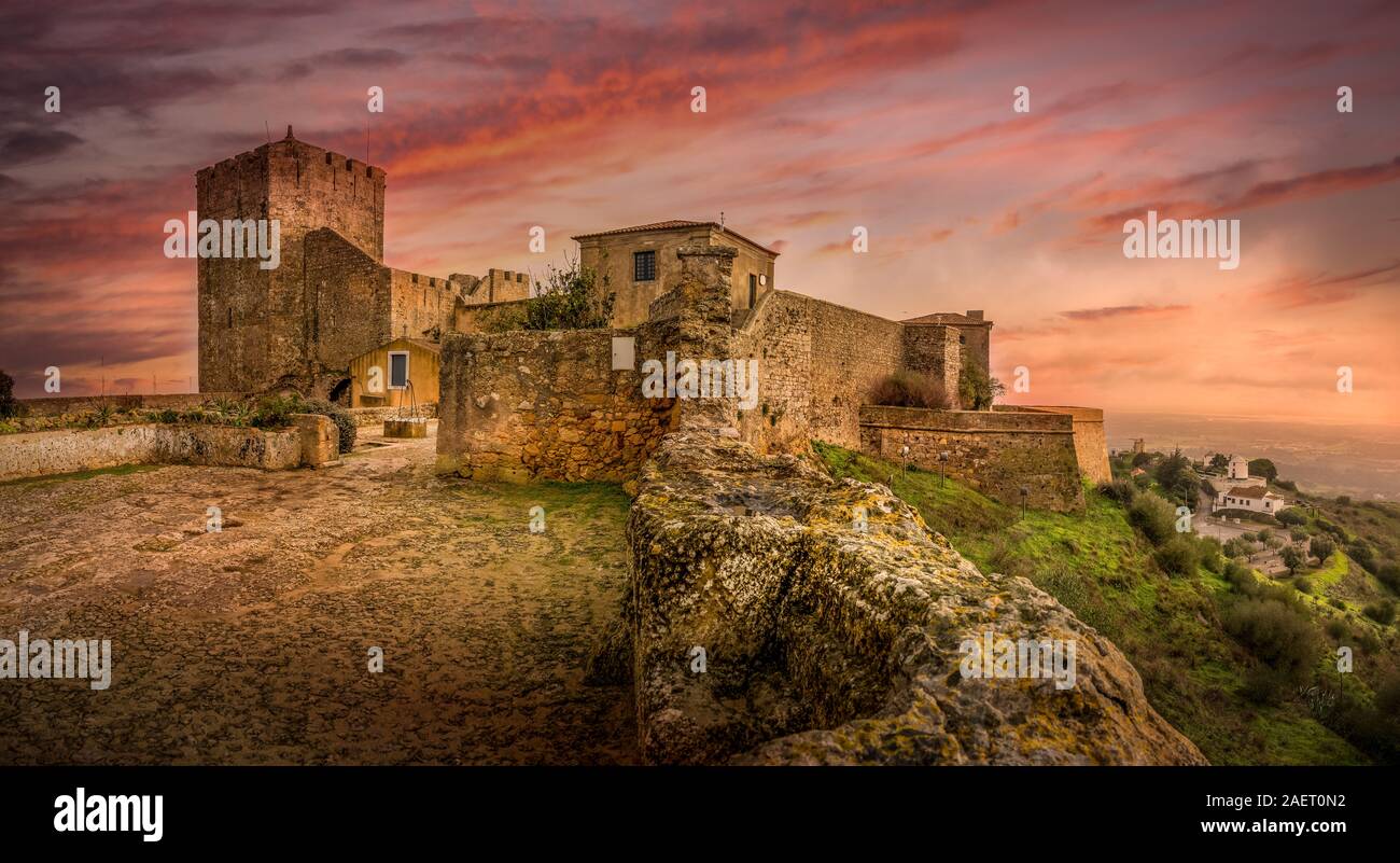 View of the medieval castle of Palmela near Setubal Portugal with dramatic sky Stock Photo