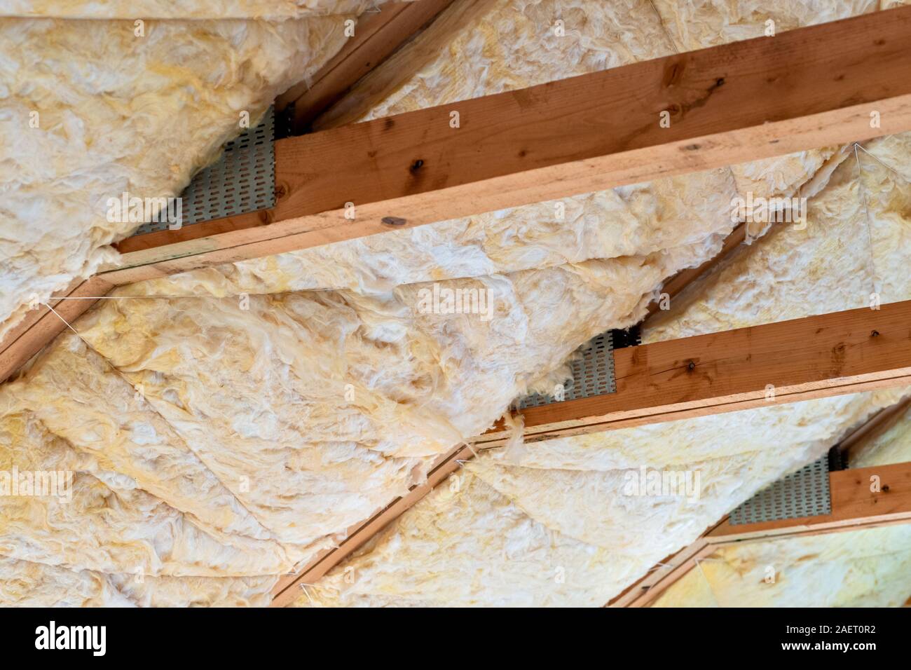 Glass mineral wool insulation in between roof rafters Stock Photo Alamy