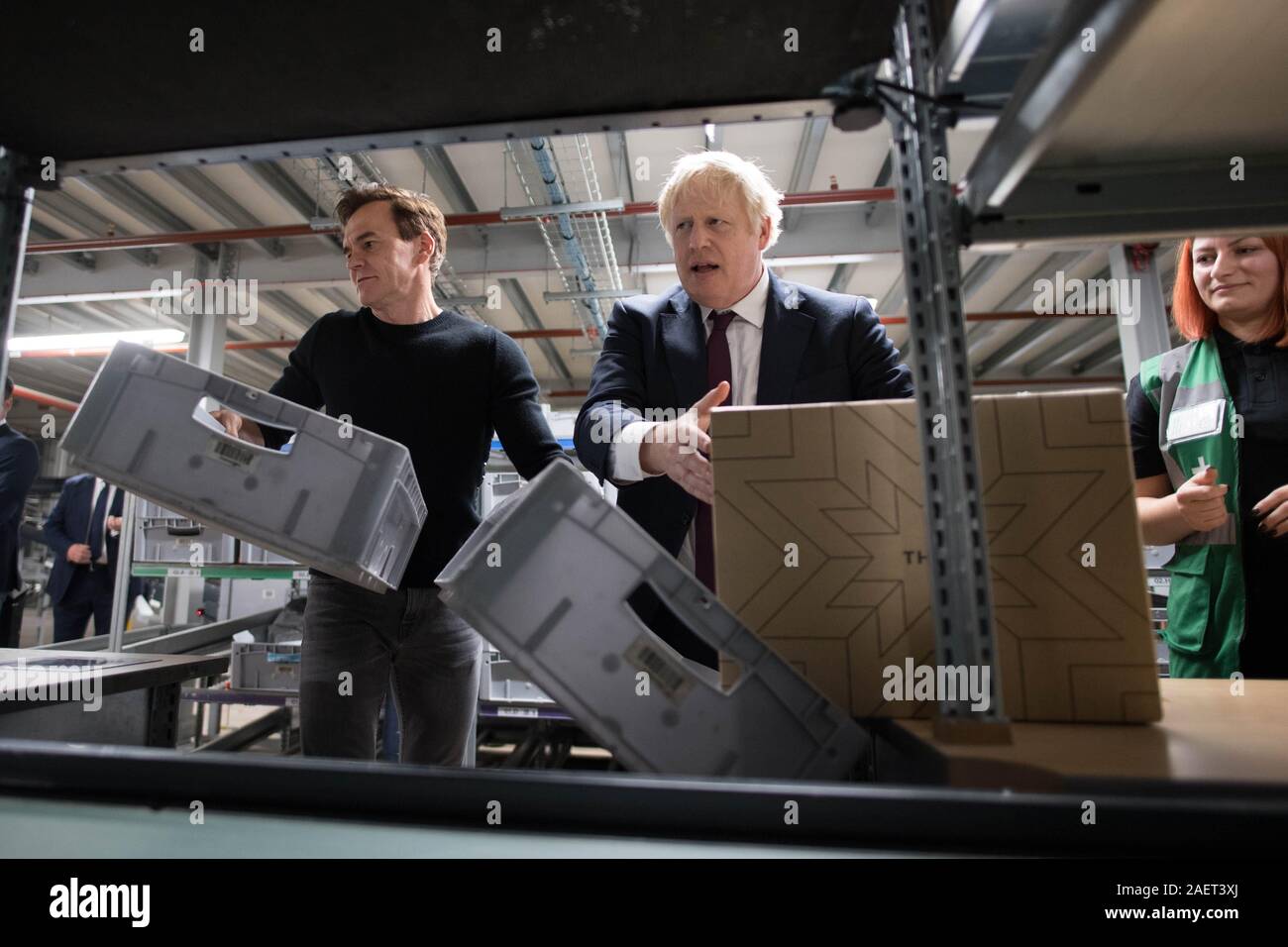 Prime Minister Boris Johnson during a visit to The Hut Group in Burtonwood, Warrington, while on the General Election campaign trail. Stock Photo