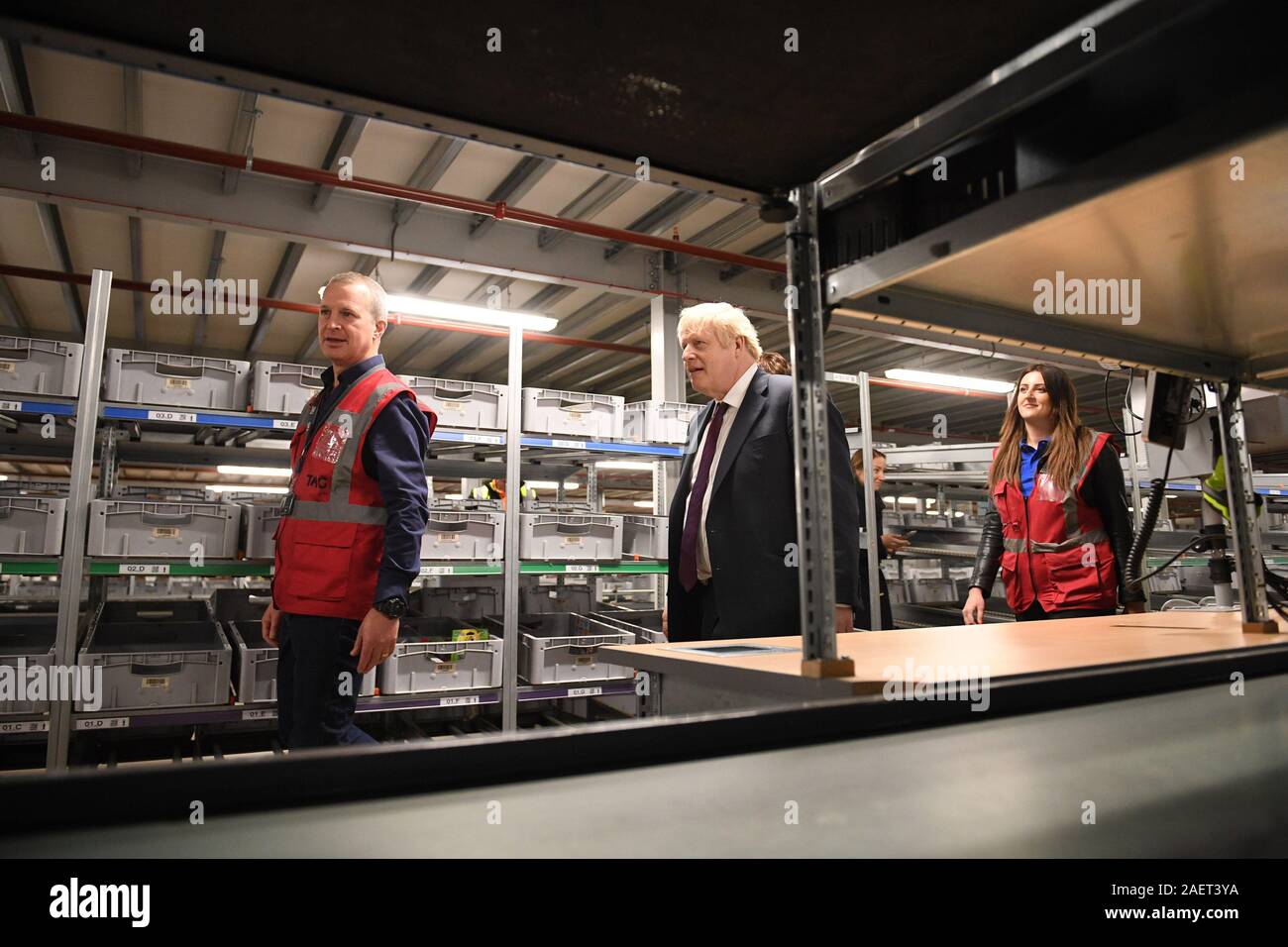 Prime Minister Boris Johnson during a visit to The Hut Group in Burtonwood, Warrington, while on the General Election campaign trail. Stock Photo