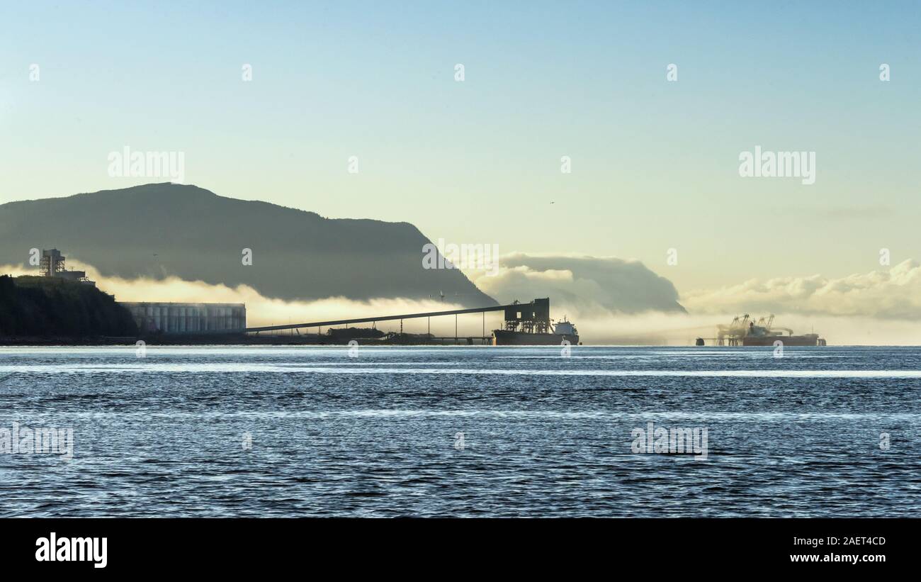 Prince Rupert bulk handling terminal (coal, grain) in the morning fog, Ridley Island, British Columbia Stock Photo