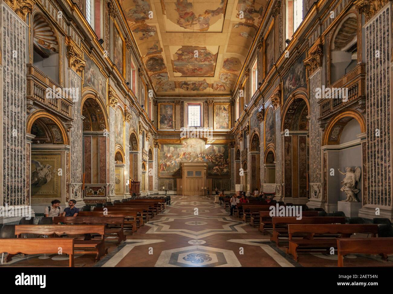 The church of San Paolo Maggiore, with columns of greek dioscuri temple, Neples City Center, Campania, Italy Stock Photo