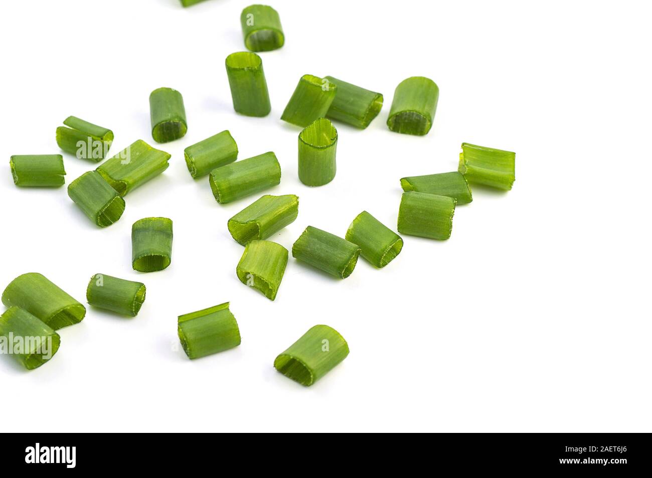 Chopped fresh green onions isolated on white background Stock Photo - Alamy