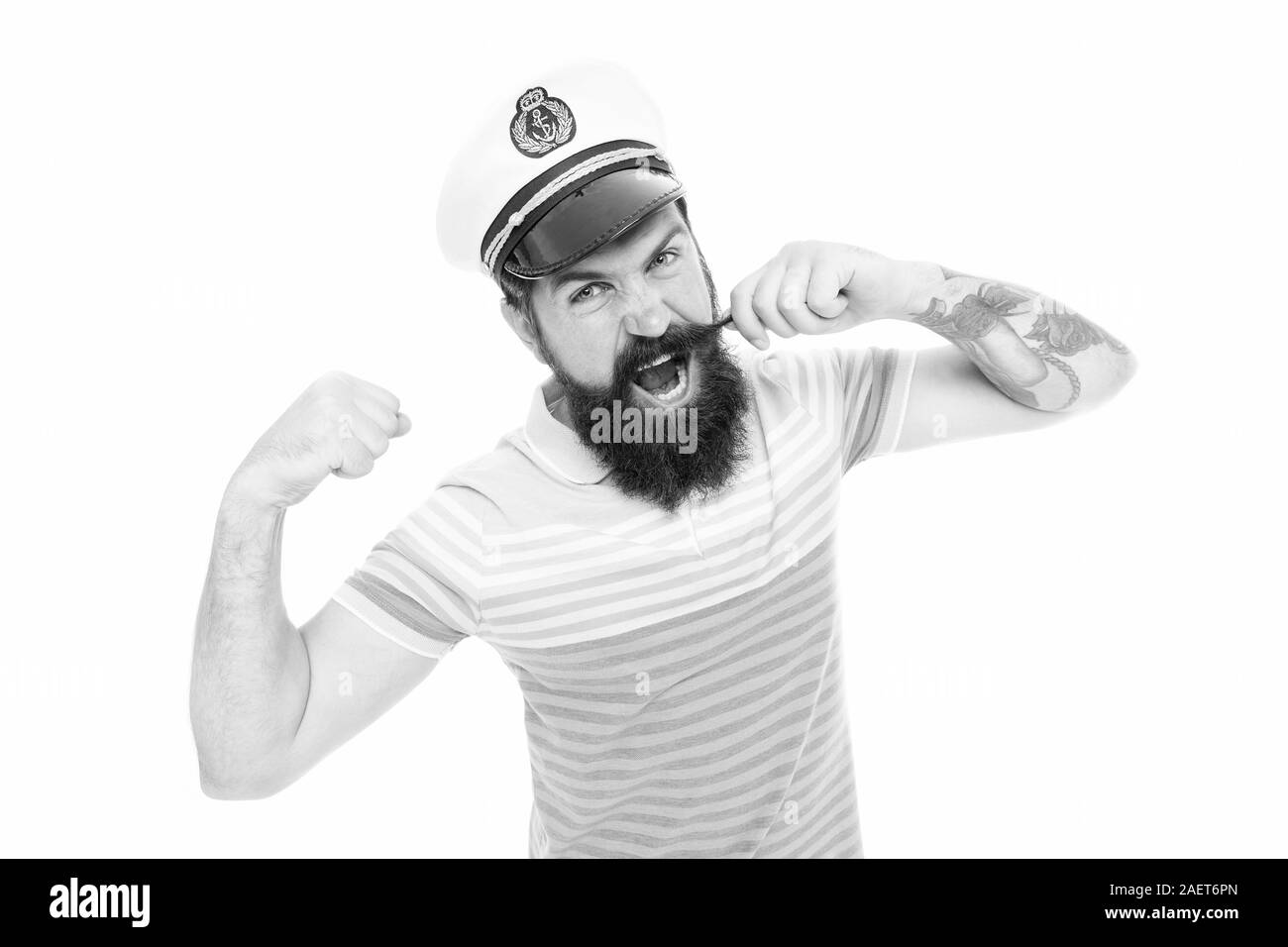 Sea captain, ocean spirit. Strong captain twirl mustache isolated on white. Captain commander of ship. Bearded man captain in striped blue. Cruise ship. Sea travel agency. Marine companies. Stock Photo