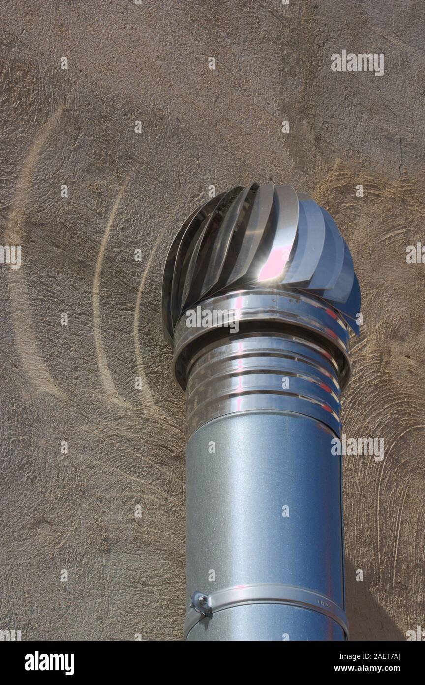 Rotating head of a chimney dedicated to extract the air from a room Stock Photo