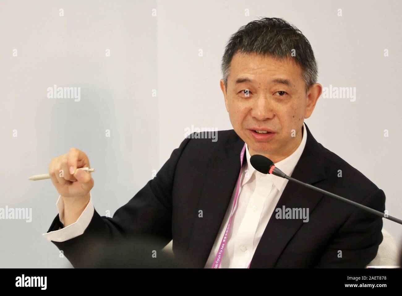 --FILE--Wang Jian, CTO of Chinese multinational conglomerate holding company Alibaba Group, delivers a speech at Boao Forum for Asia in Boao town, Qio Stock Photo