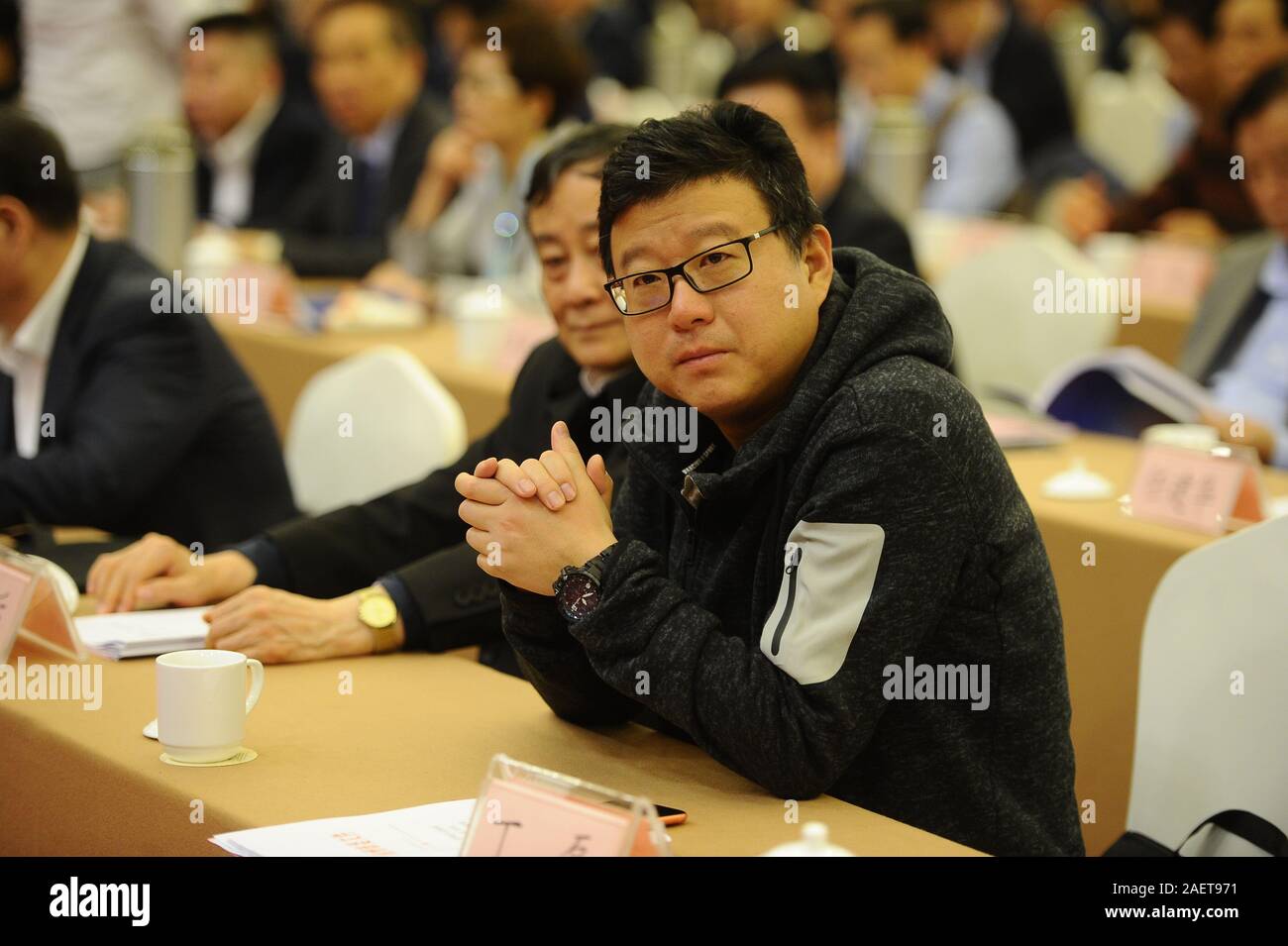 --FILE--William Ding Lei, CEO of NetEase, or known as 163.com, attends a meeting in Hangzhou city, east China's Zhejiang province, 9 November 2018. Stock Photo