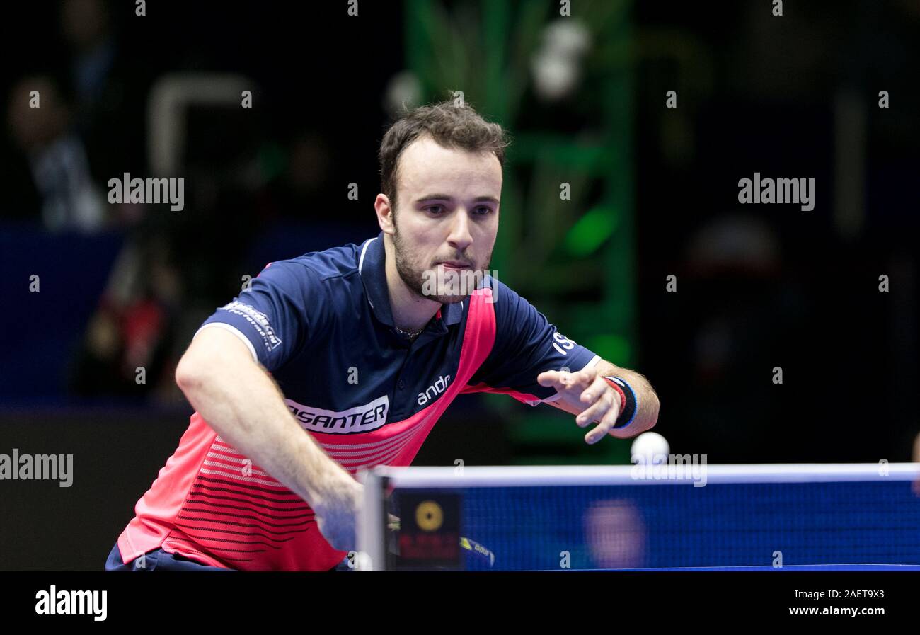Gauzy Simon of France gets the ball against Ma Long of China (not pictured)  at the Round of 16 International Table Tennis Federation (ITTF) Men's Worl  Stock Photo - Alamy
