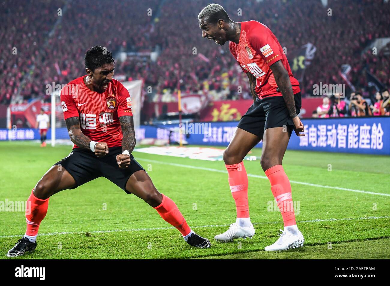 Brazilian football player Paulinho, left, and Brazilian football player Anderson Souza Conceicao, known as Anderson Talisca or simply Talisca, right, Stock Photo