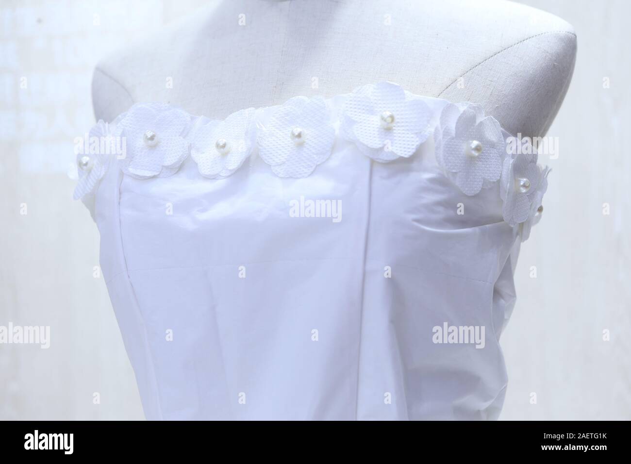 A Purely Wide Wedding Dress Made Of Tissue Paper Is Exhibited At A