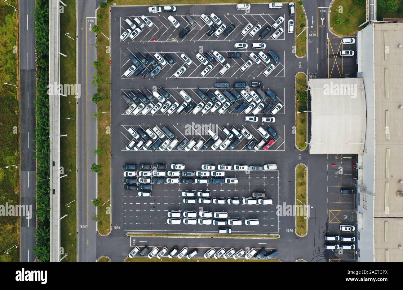 An aerial view of various kinds of cars line up at Panyu Motor Town