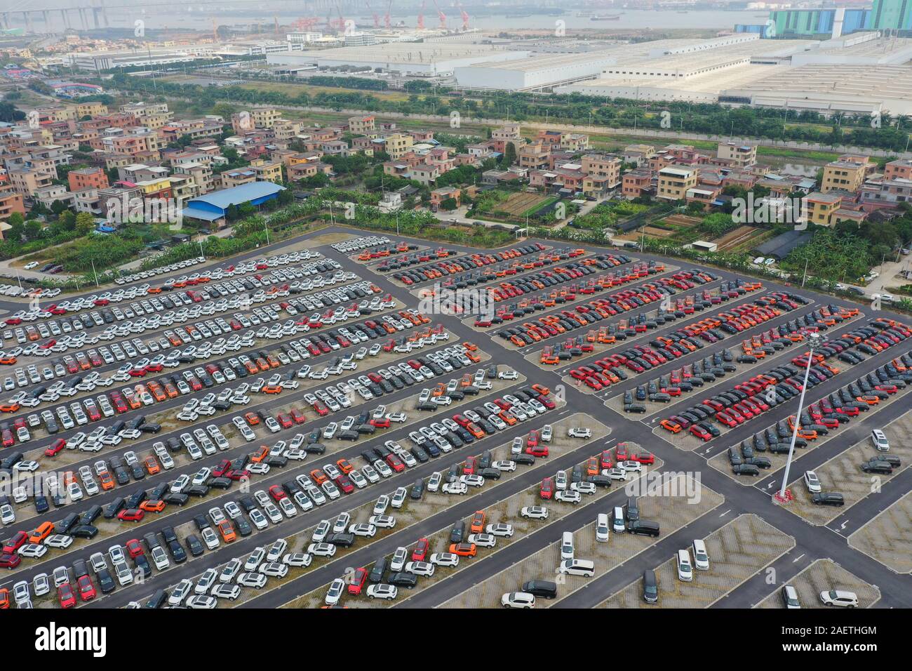 An aerial view of various kinds of cars line up at Panyu Motor Town