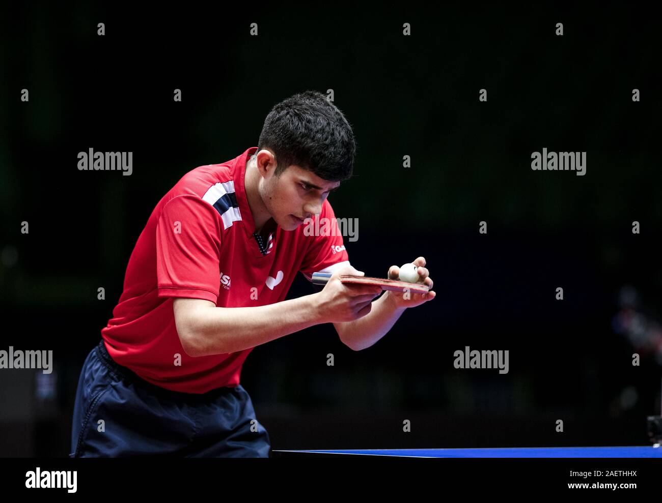 Kanak Jha of the US is in action against Lee Sangsu of South Korea