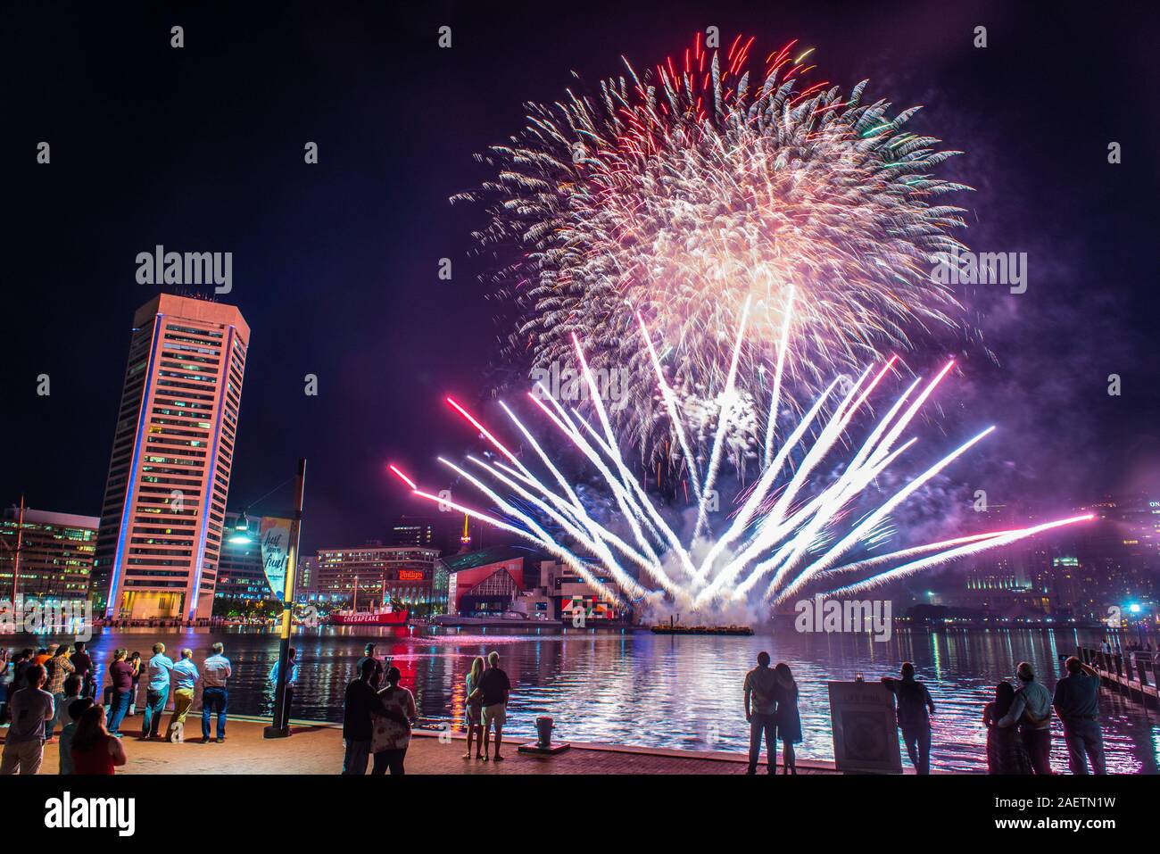 Colorful fireworks light up the night sky over Baltimore's inner harbor