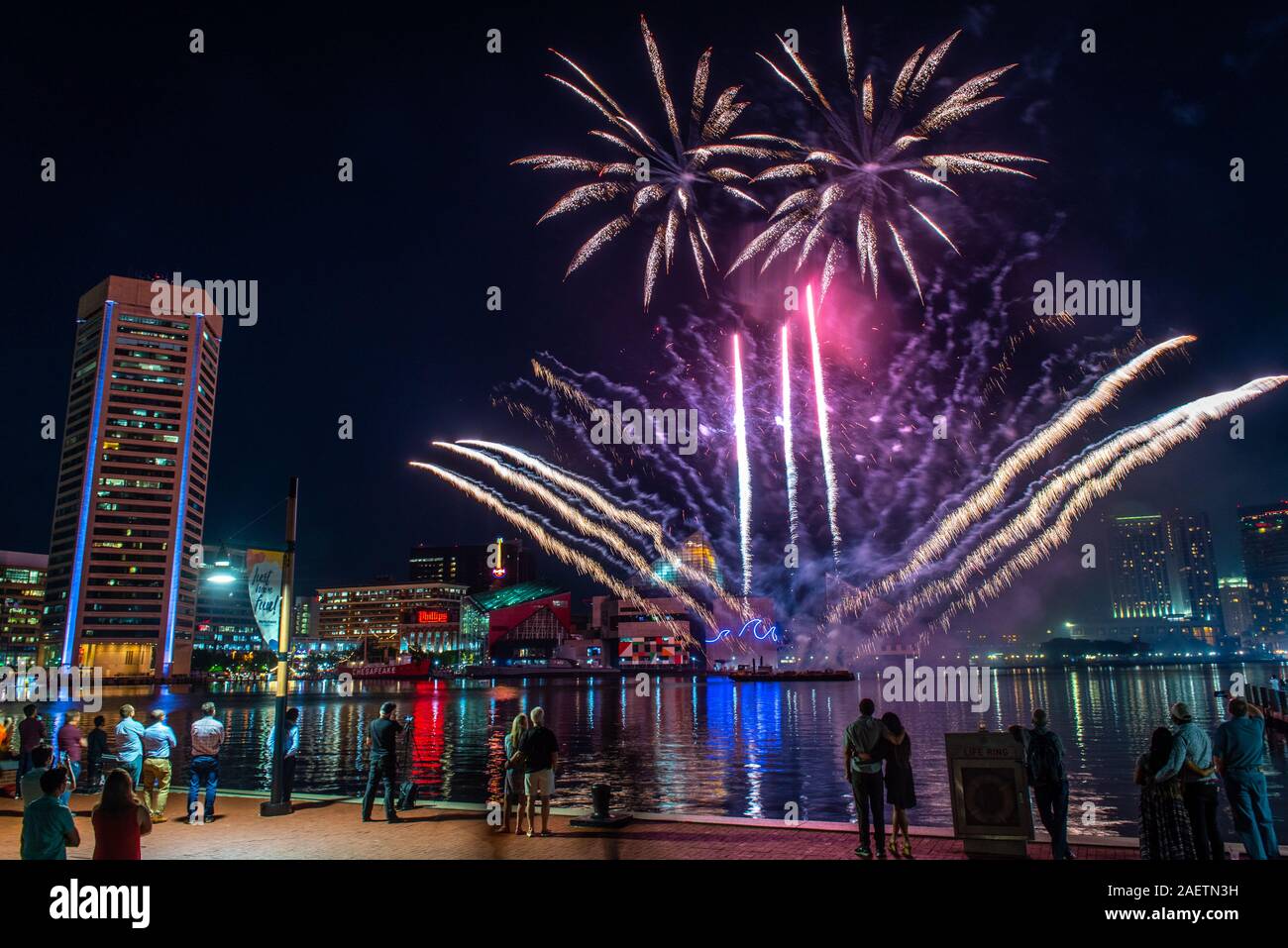 Colorful fireworks light up the night sky over Baltimore's inner harbor