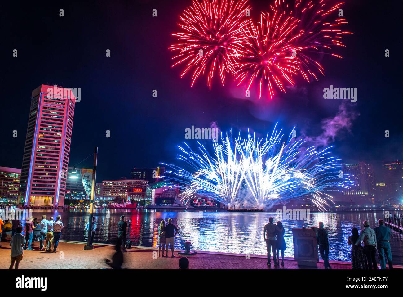 Colorful fireworks light up the night sky over Baltimore's inner harbor