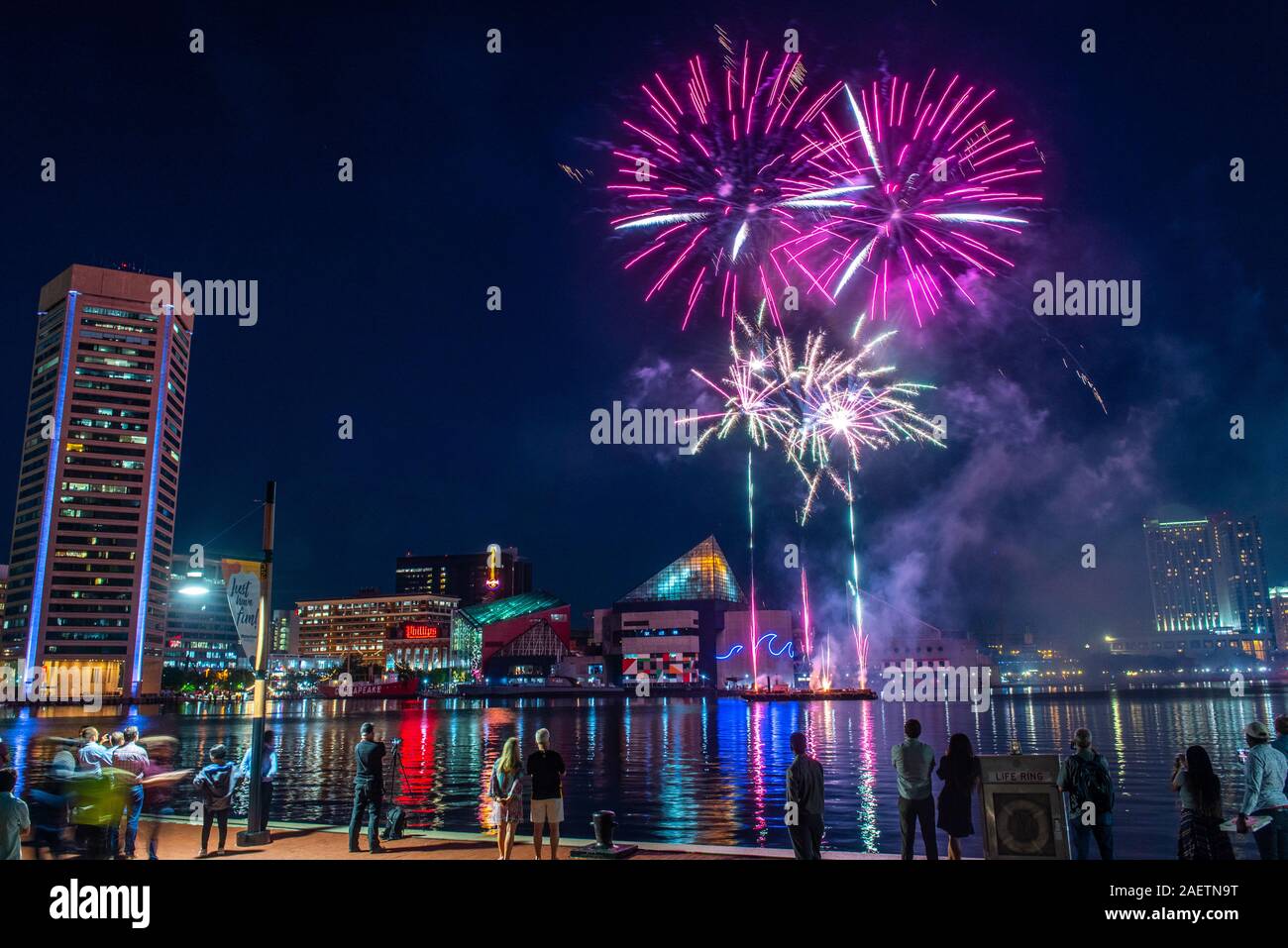 Colorful fireworks light up the night sky over Baltimore's inner harbor