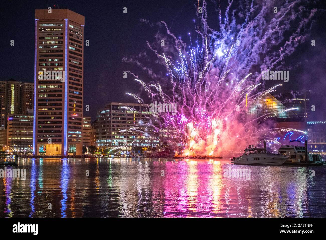 Colorful fireworks light up the night sky over Baltimore's inner harbor