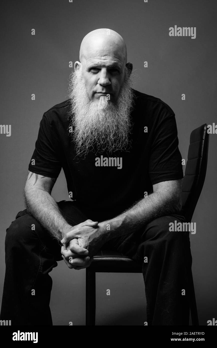 Bald white shirt Black and White Stock Photos & Images - Alamy