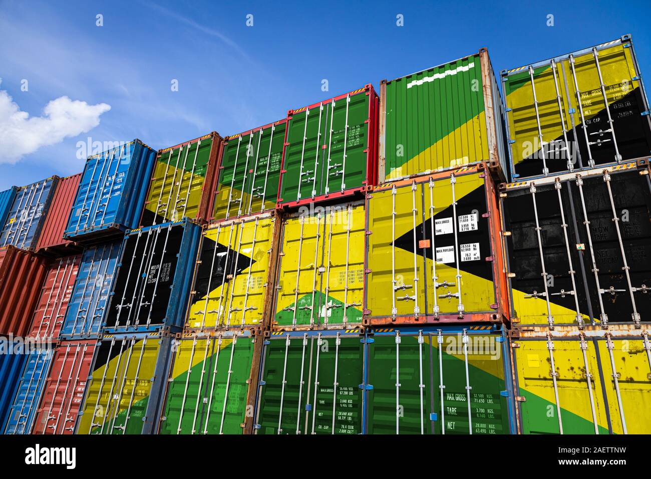 The national flag of Jamaica on a large number of metal containers for