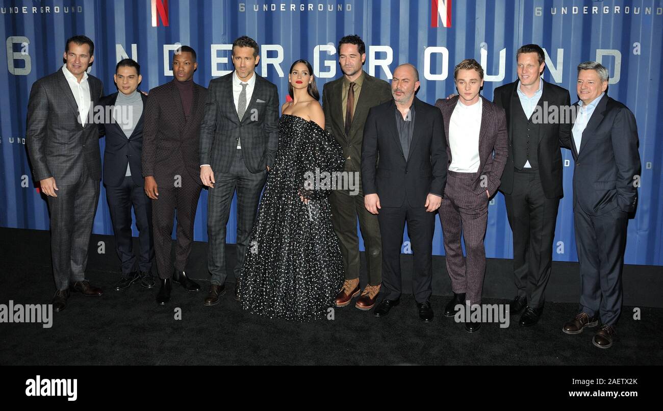 New York, USA. 10th Dec, 2019. L-R: Netflix exec Scott Stuber, actors Payman Maadi, Corey Hawkins, Ryan Reynolds, Adria Arjona, Manuel Garcia-Rulfo, Lior Raz and Ben Hardy, producer David Ellison and Netflix exec Ted Sarandos attend the NY premiere of 6 Underground at The Shed at Hudson Yards in New York, NY on December 10, 2019. (Photo by Stephen Smith/SIPA USA) Credit: Sipa USA/Alamy Live News Stock Photo