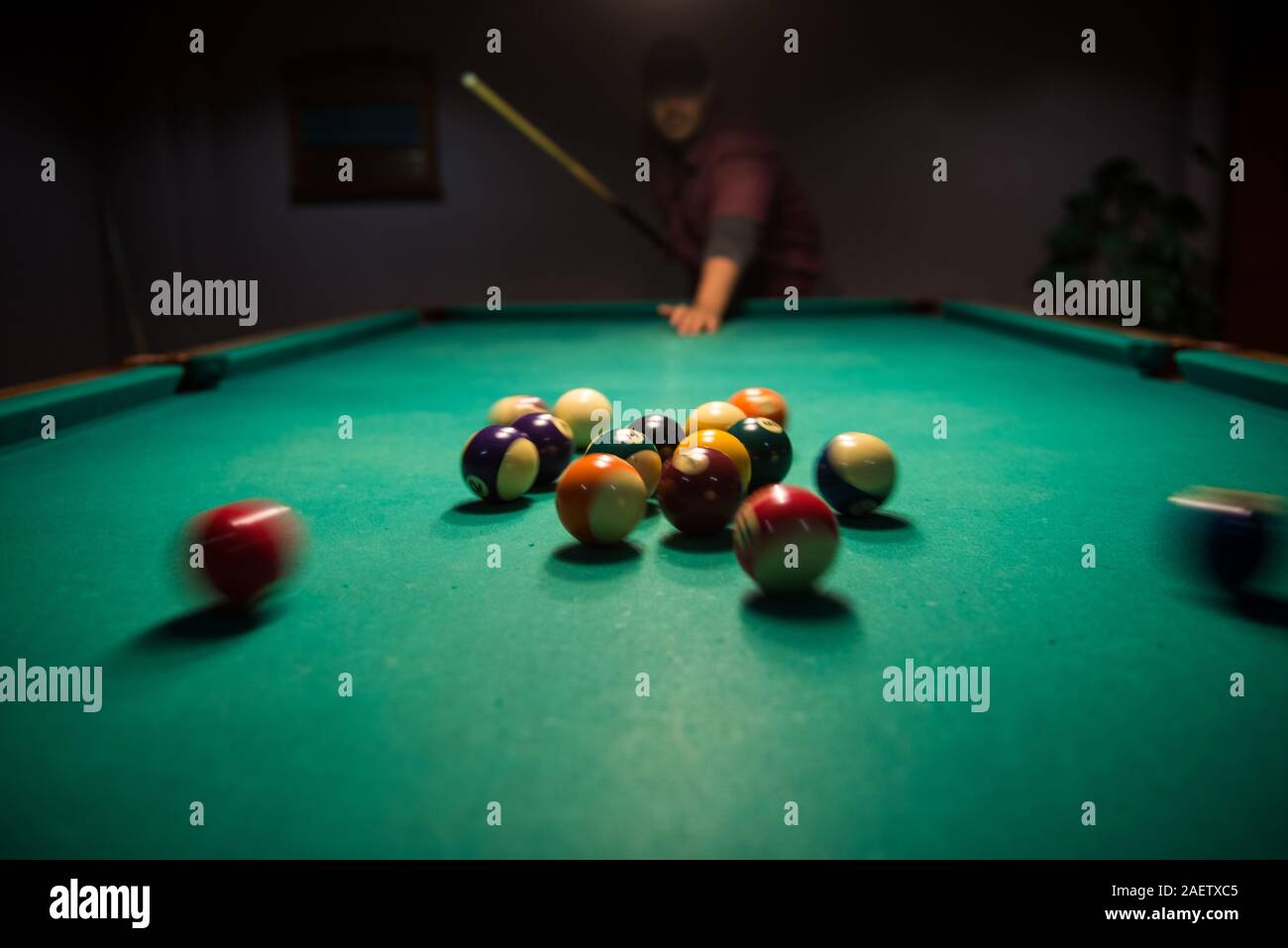 Male breaks up the balls in the game of billiard Stock Photo Alamy