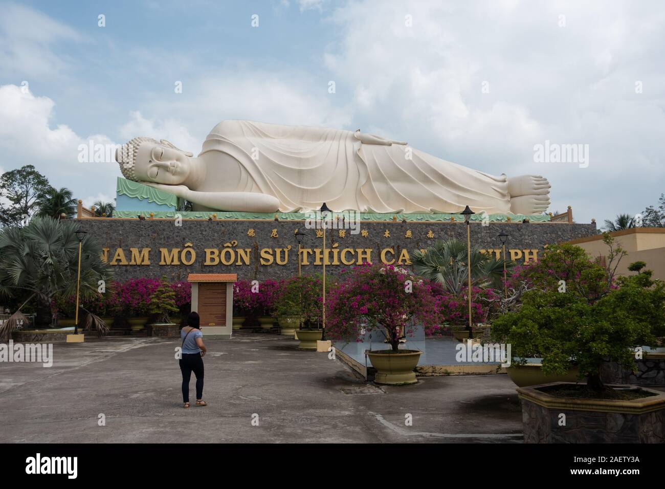A giant statue of a lying down Buddha at Vinh Trang pagoda in southern