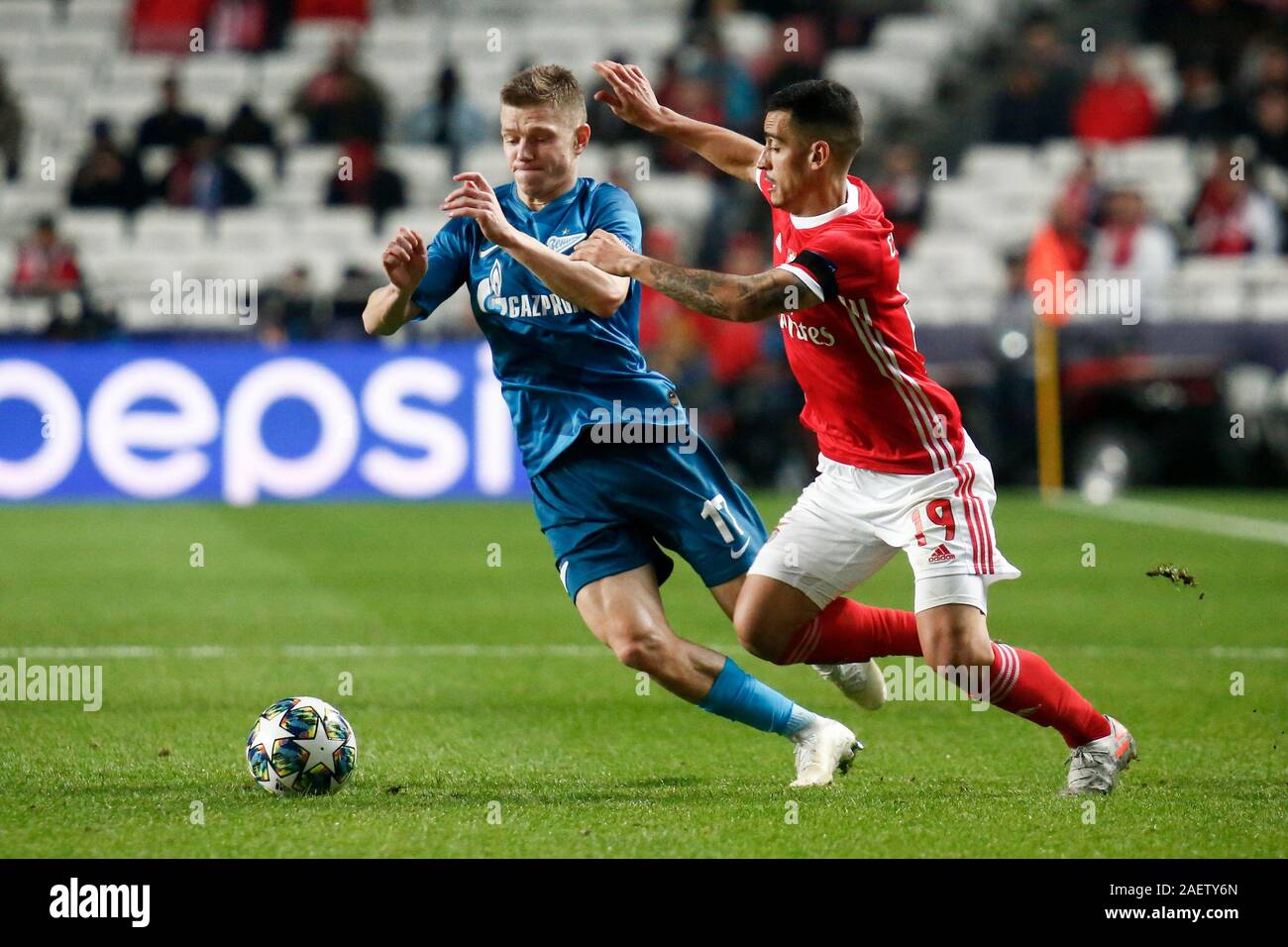 Saint Petersburg, Russia. 11th Dec, 2019. Chiquinho (Francisco Leonel Lima Silva Machado) (R) of Benfica and Oleg Shatov (L) of Zenit are seen in action during the UEFA Champions League group G match between SL Benfica Lisbon and Zenit at Gazprom Arena in St. Petersburg.(Final score; SL Benfica Lisbon 3:0 Zenit) Credit: SOPA Images Limited/Alamy Live News Stock Photo