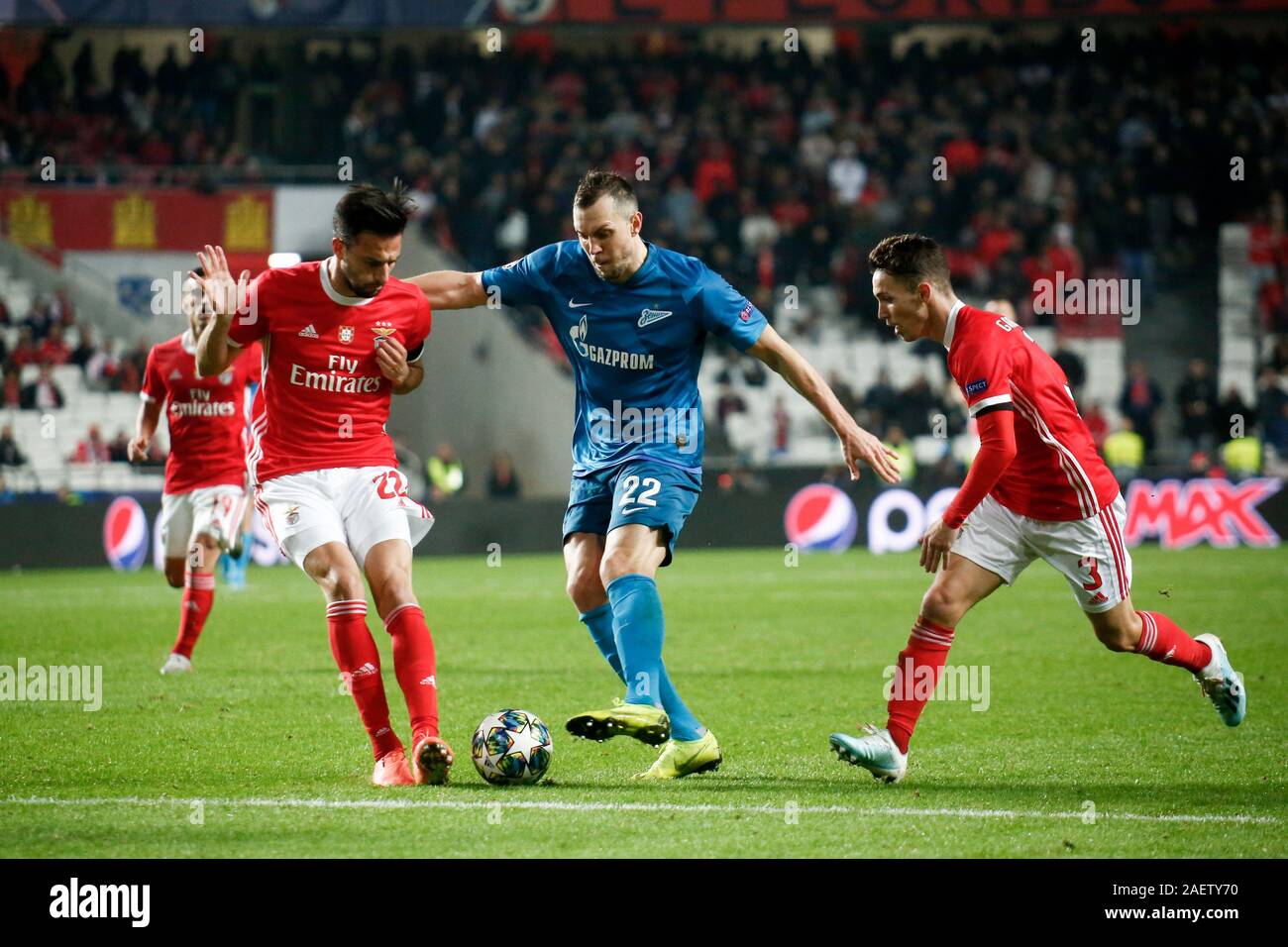 Saint Petersburg, Russia. 11th Dec, 2019. Andreas Samaris (L), Alex Grimaldo (R) of Benfica and Artem Dzyuba (C) of Zenit are seen in action during the UEFA Champions League group G match between SL Benfica Lisbon and Zenit at Gazprom Arena in St. Petersburg.(Final score; SL Benfica Lisbon 3:0 Zenit) Credit: SOPA Images Limited/Alamy Live News Stock Photo