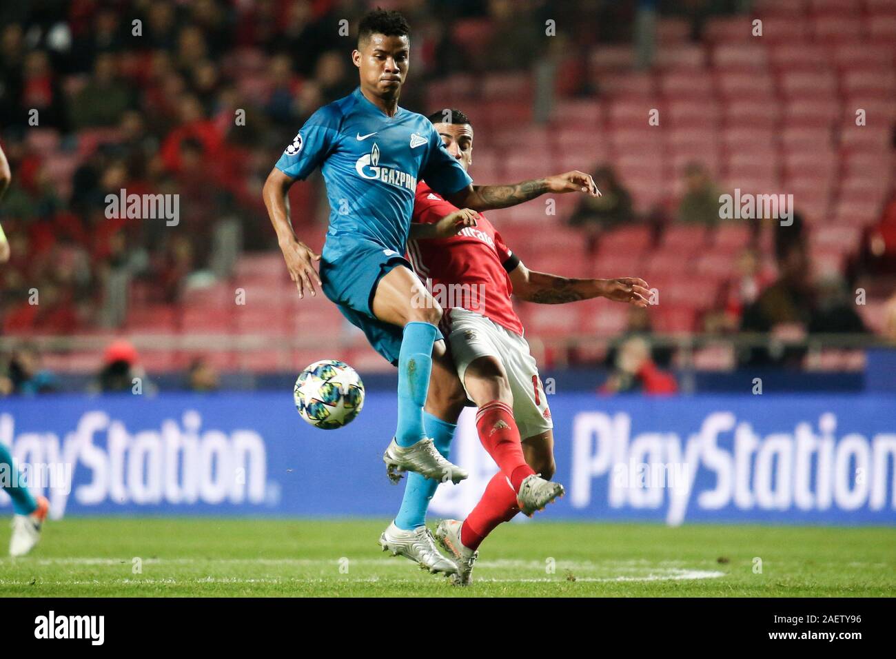 Saint Petersburg, Russia. 10th Dec, 2019. Chiquinho (Francisco Leonel Lima Silva Machado) (R) of Benfica and Wilmar Barrios (L) of Zenit are seen in action during the UEFA Champions League group G match between SL Benfica Lisbon and Zenit at Gazprom Arena in St. Petersburg.(Final score; SL Benfica Lisbon 3:0 Zenit) Credit: SOPA Images Limited/Alamy Live News Stock Photo