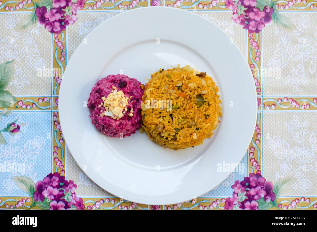 Party salad and rice with chicken, two traditional recipes from Panama Stock Photo