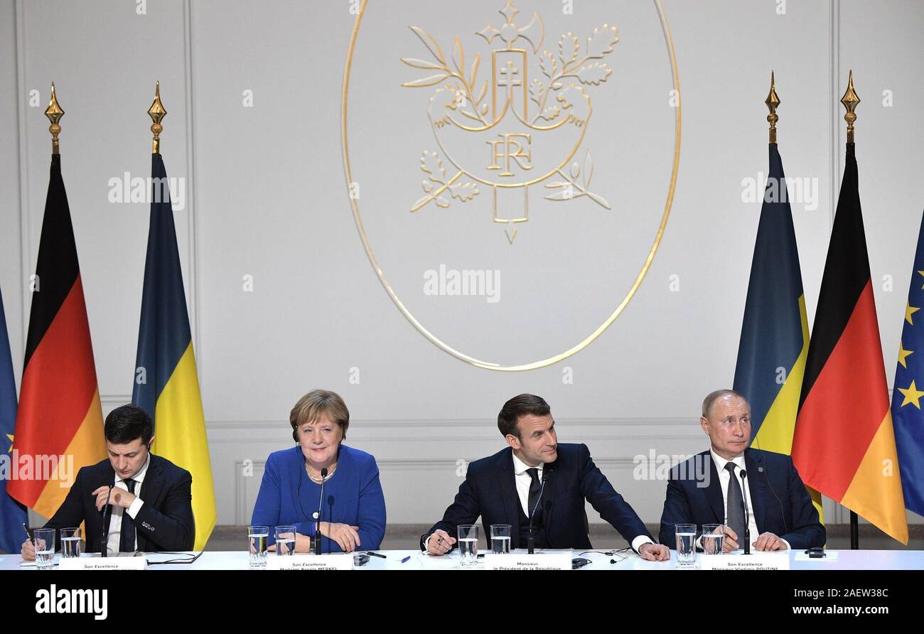 December 10, 2019. - France, Paris. - Ukraine's President Volodymyr Zelensky, Germany's Chancellor Angela Merkel, France's President Emmanuel Macron, and Russia's President Vladimir Putin (from L to R) give a news conference after a Normandy Four summit at the Elysee Palace. Stock Photo