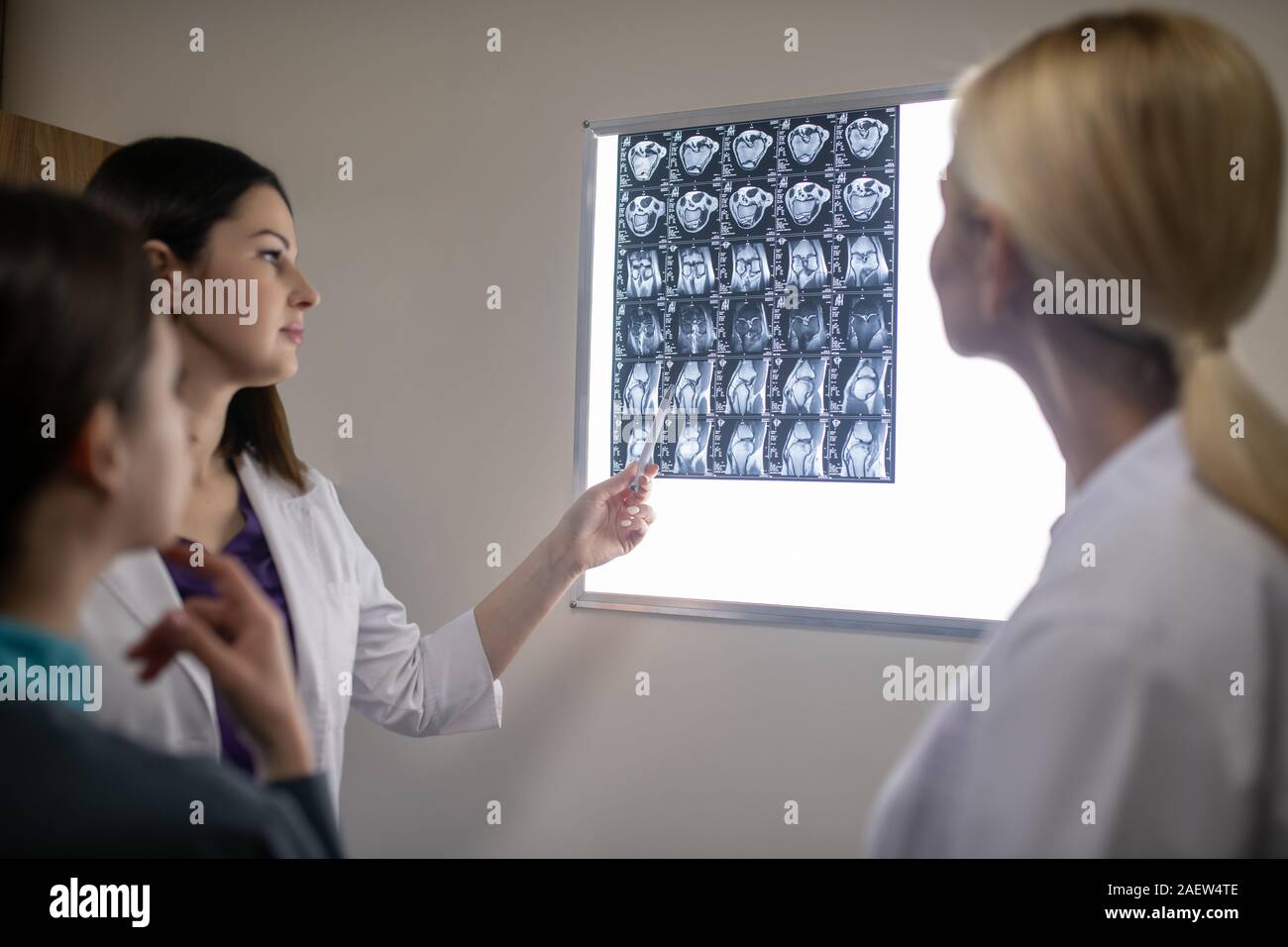 Doctors in neurological clinic discussing mri scan Stock Photo