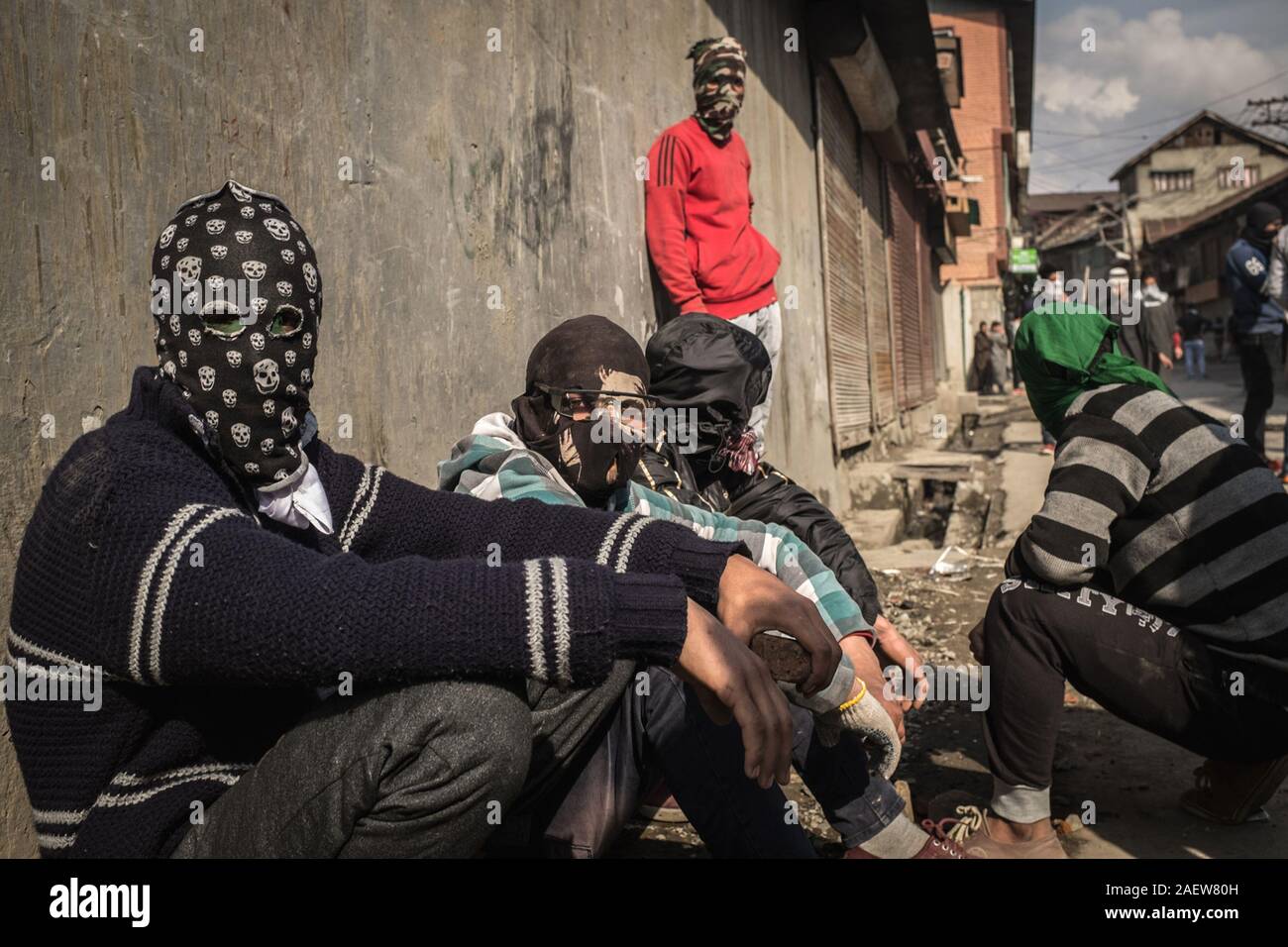 kashmir stone pelters sitting on streets Stock Photo