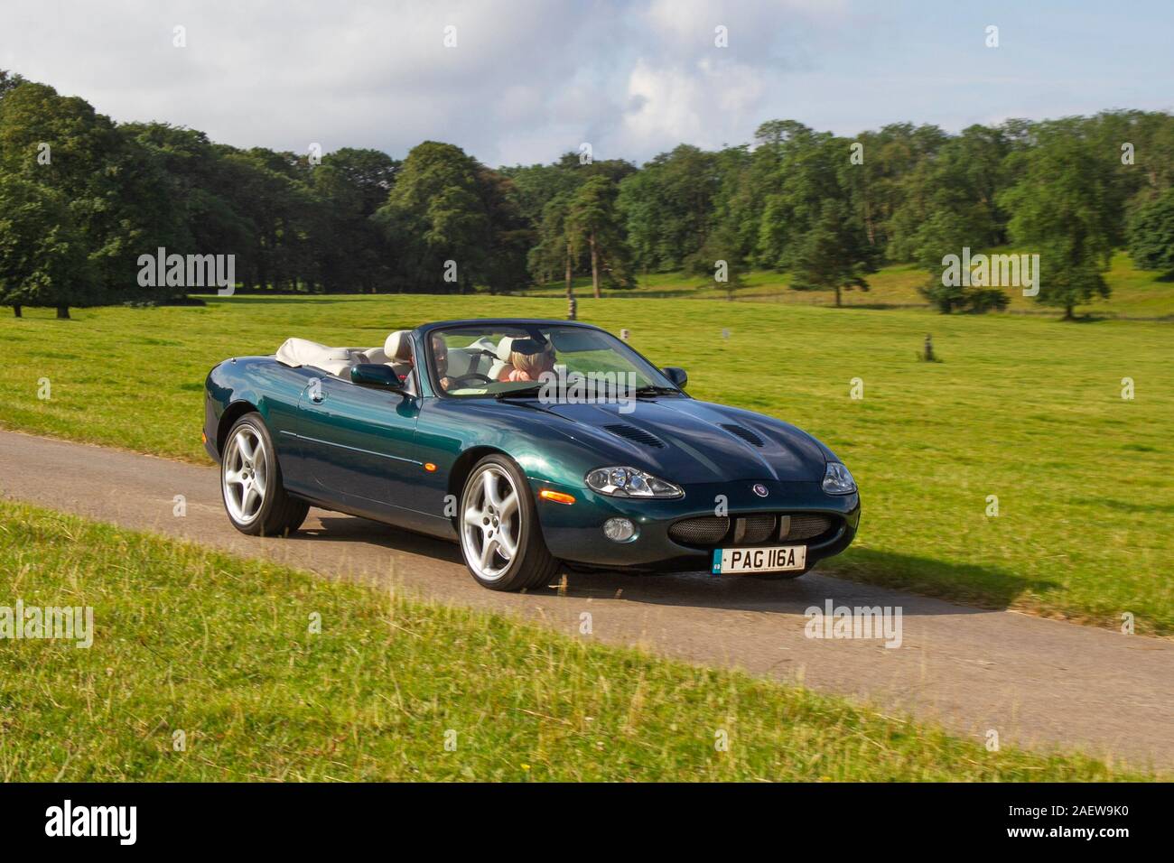 2002 green Jaguar XKR auto; Classic cars, historics, cherished, old timers, collectable restored vintage veteran, collector vehicles of yesteryear arriving for the Mark Woodward motoring event at Leighton Hall, Carnforth, UK Stock Photo