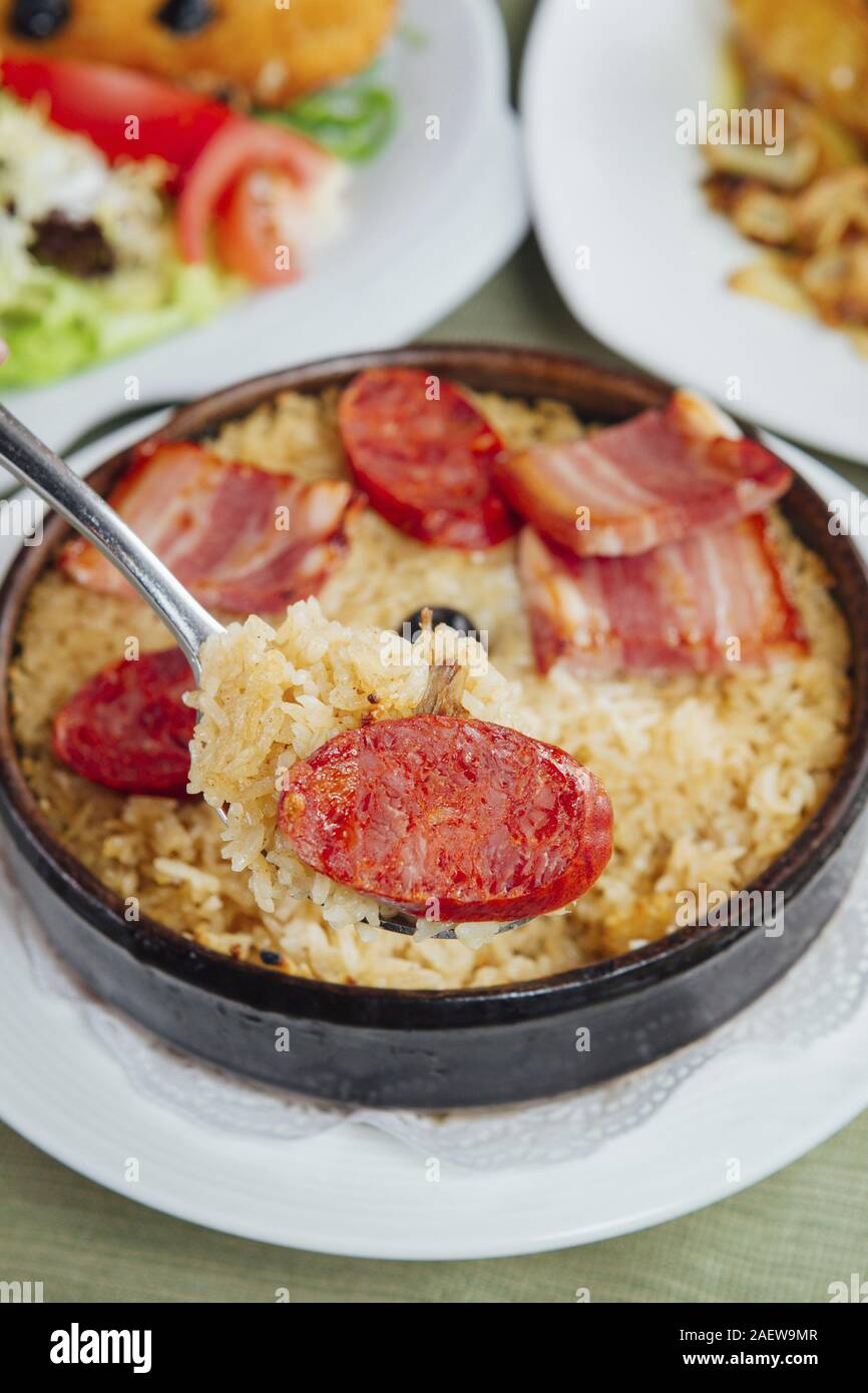 cook rice in hot pot Stock Photo Alamy