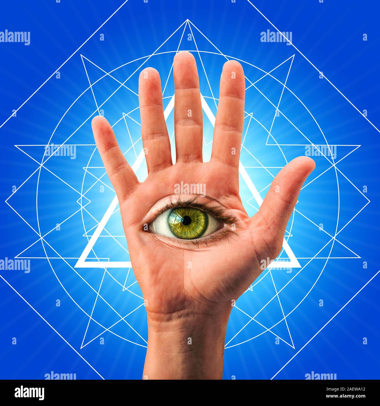 Eye in the palm of the hand. Spiritual symbol concept. Stock Photo